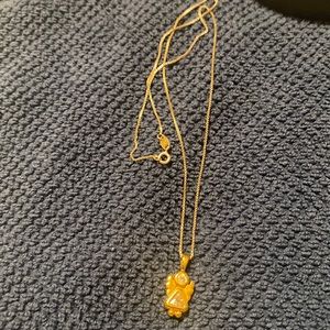 Gold over silver chain and angel charm.